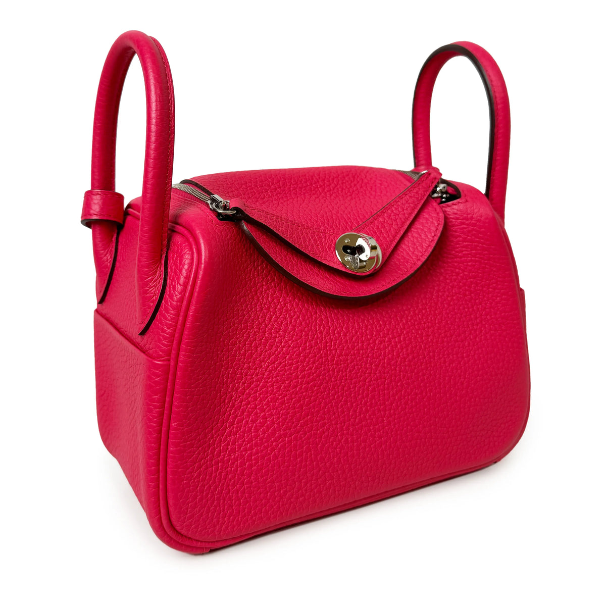 Pink pebbled leather handbag with top handles and silver hardware, curated Pre-loved Luxury by Myluxe in Helsinki.