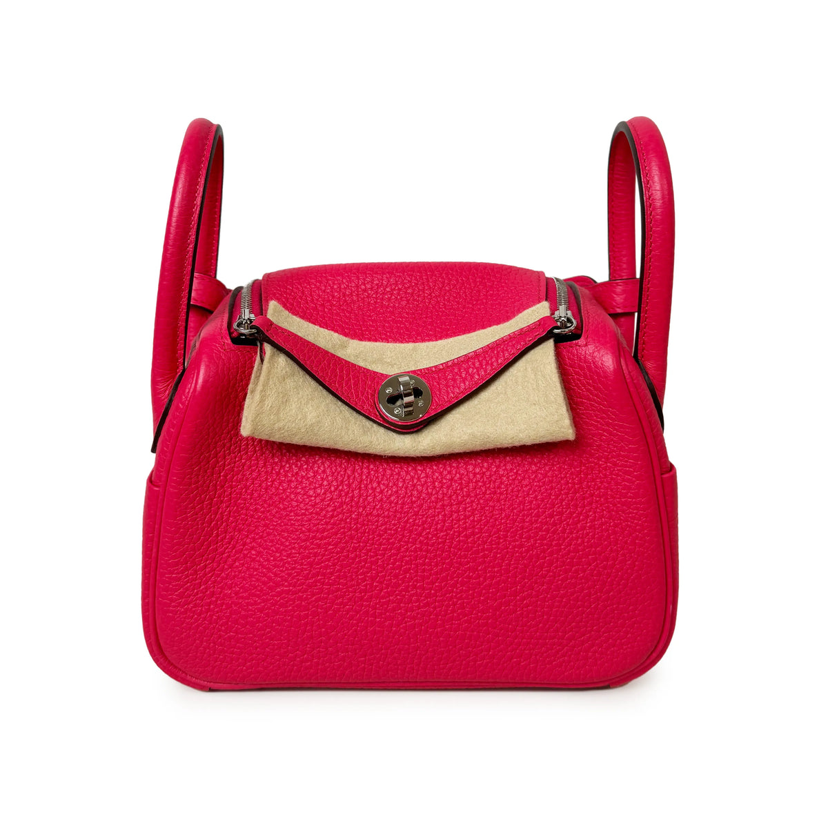 Pink pebbled leather handbag with beige wool flap and silver hardware, curated Pre-loved Luxury by Myluxe in Helsinki.