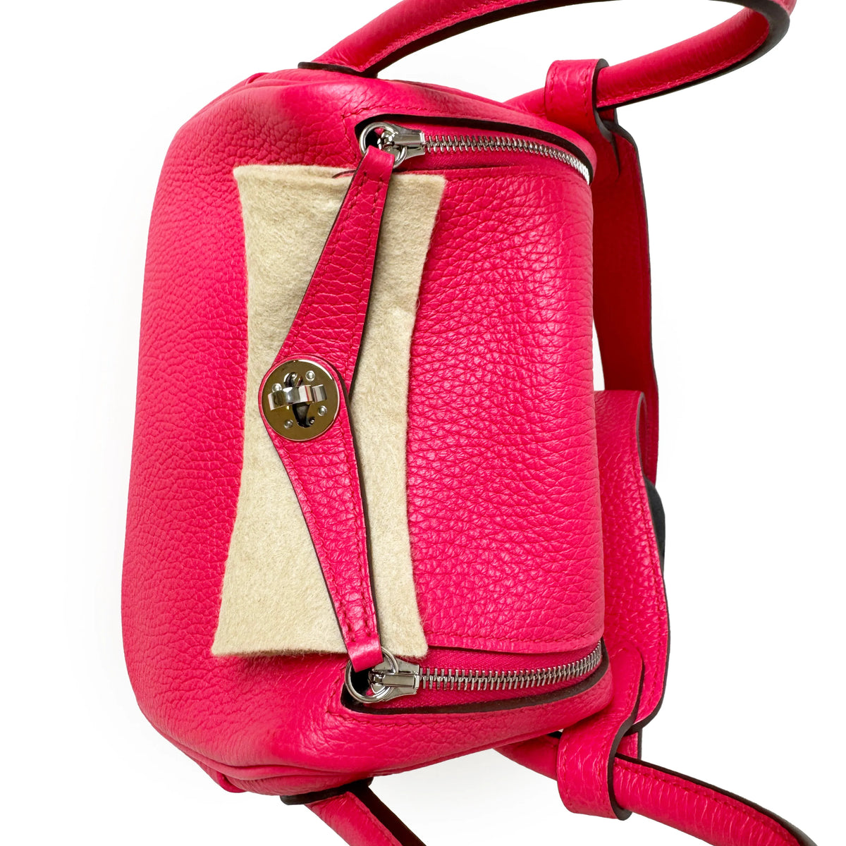 Hot pink pebbled leather backpack with cream shearling panel, curated Pre-loved Luxury by Myluxe in Helsinki.