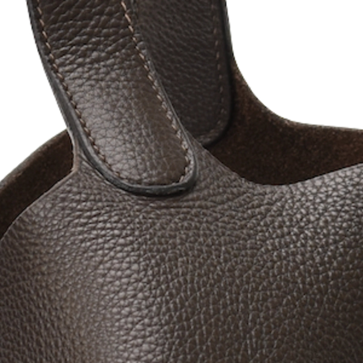 Close-up of brown Clemence leather stitching on a Hermès Picotin 22. curated Pre-loved Luxury by Myluxe in Helsinki.