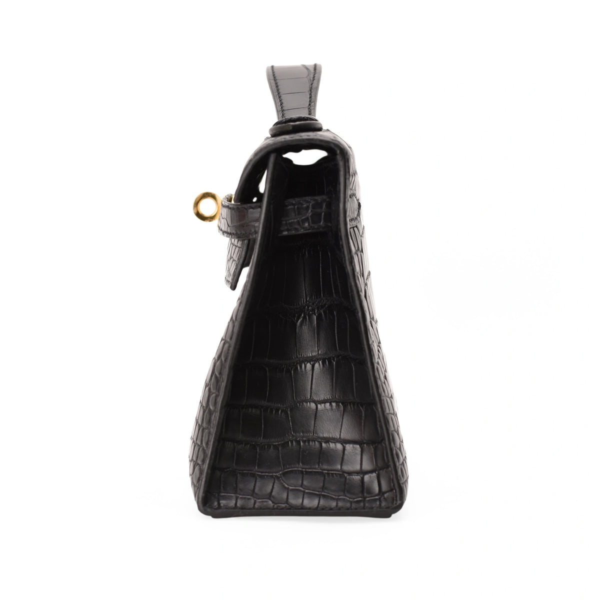 Hermès Kelly Pochette in black matte alligator leather with gold hardware. curated Pre-loved Luxury by Myluxe in Helsinki.