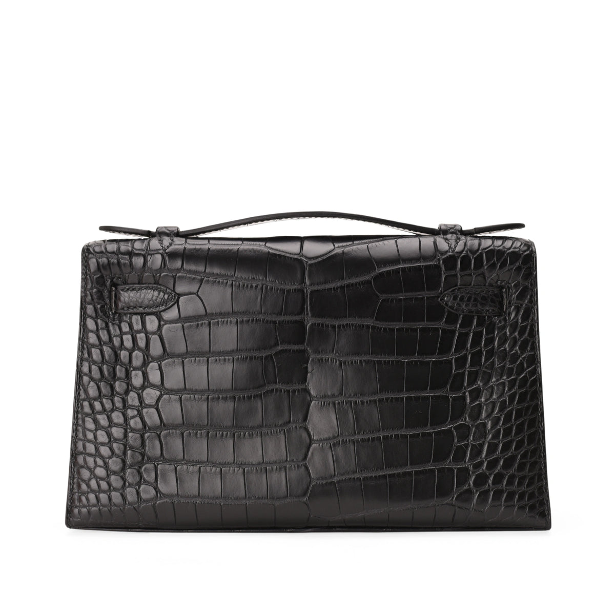 Hermès Kelly Pochette in black matte alligator leather with gold hardware. curated Pre-loved Luxury by Myluxe in Helsinki.