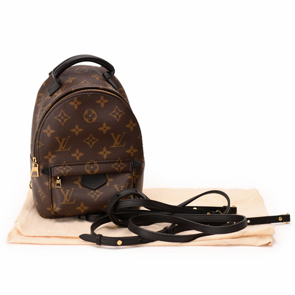 Louis Vuitton Monogram canvas mini backpack in brown leather. curated Pre-loved Luxury by Myluxe in Helsinki.