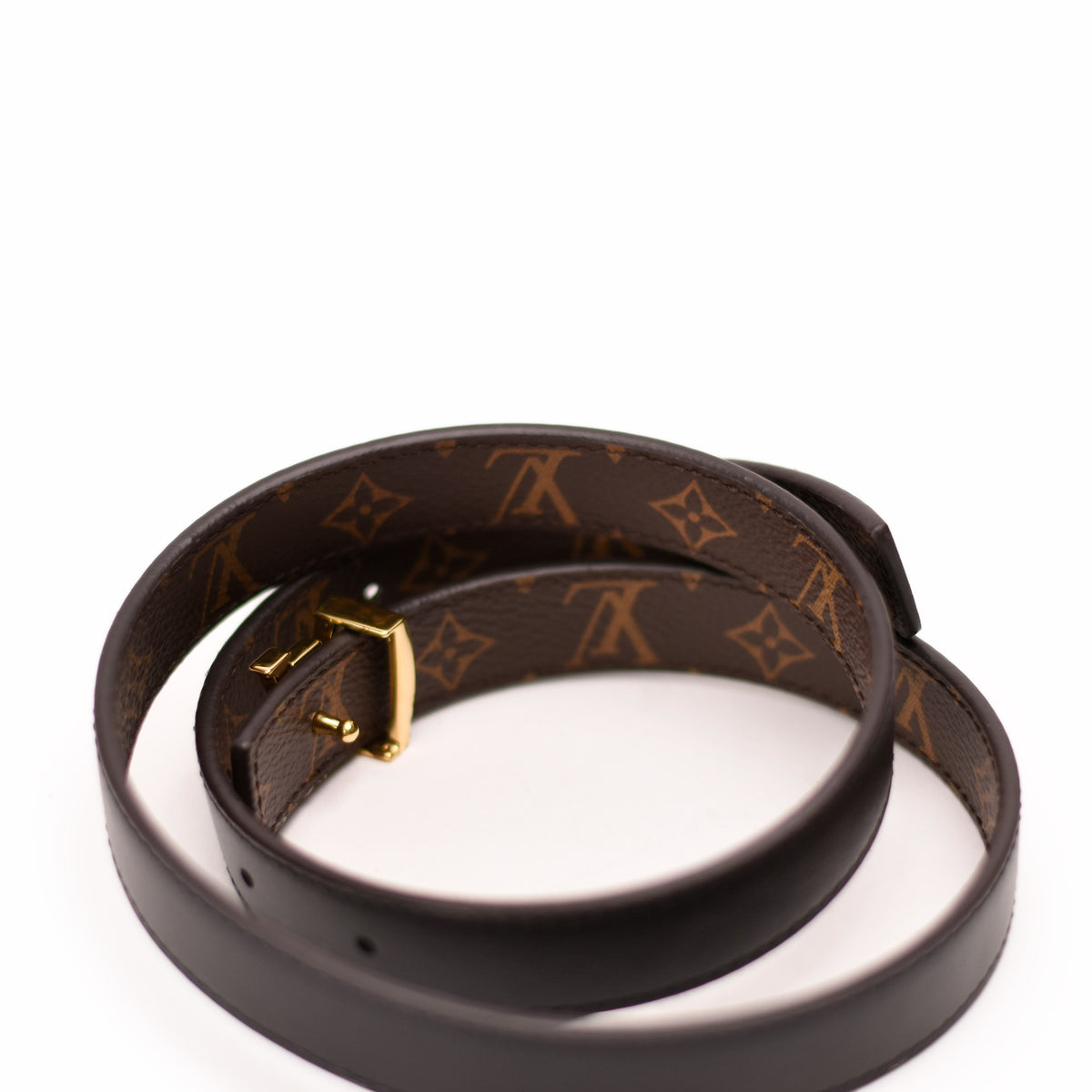 Brown Louis Vuitton monogram leather belt with gold buckle, curated Pre-loved Luxury by Myluxe in Helsinki.