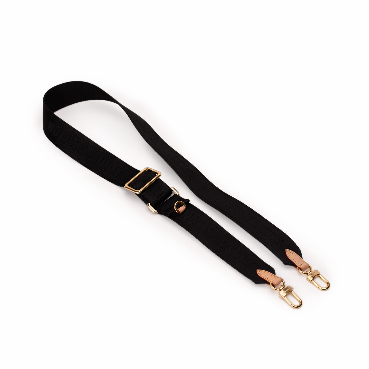 Black fabric crossbody strap with gold-tone metal hardware. curated Pre-loved Luxury by Myluxe in Helsinki.