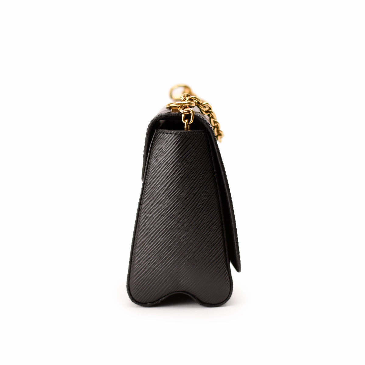 Black textured leather Chanel flap bag with gold-tone chain strap. curated Pre-loved Luxury by Myluxe in Helsinki.