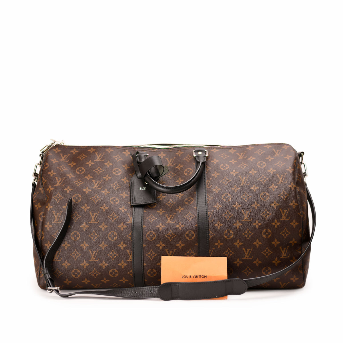 Louis Vuitton monogram brown canvas duffel bag with leather trim. curated Pre-loved Luxury by Myluxe in Helsinki.