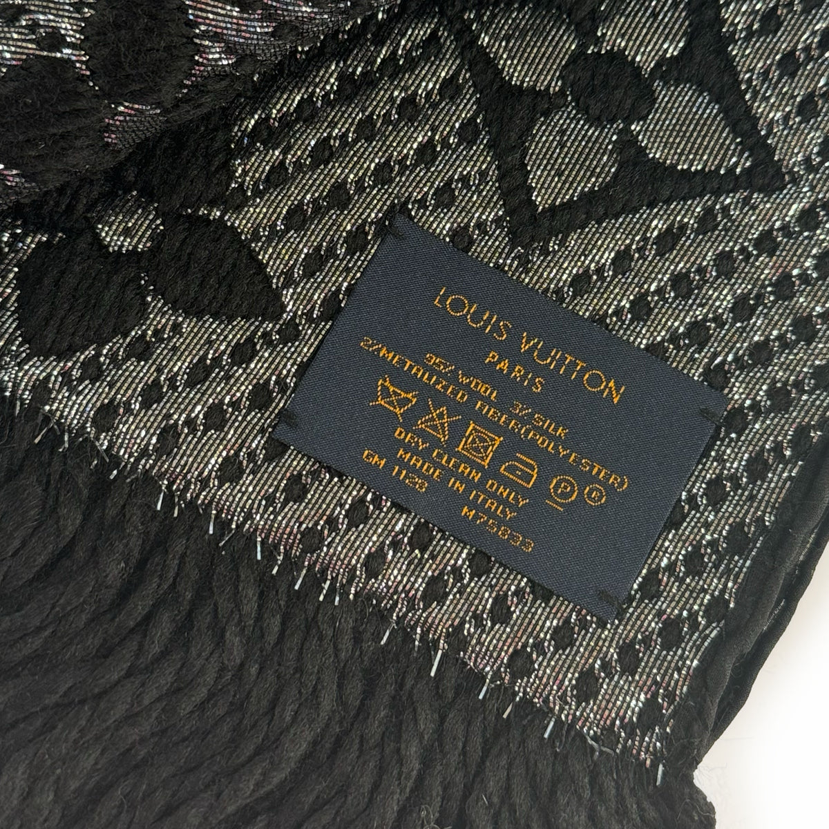 Louis Vuitton black wool and silk monogram patterned scarf, curated Pre-loved Luxury by Myluxe in Helsinki.