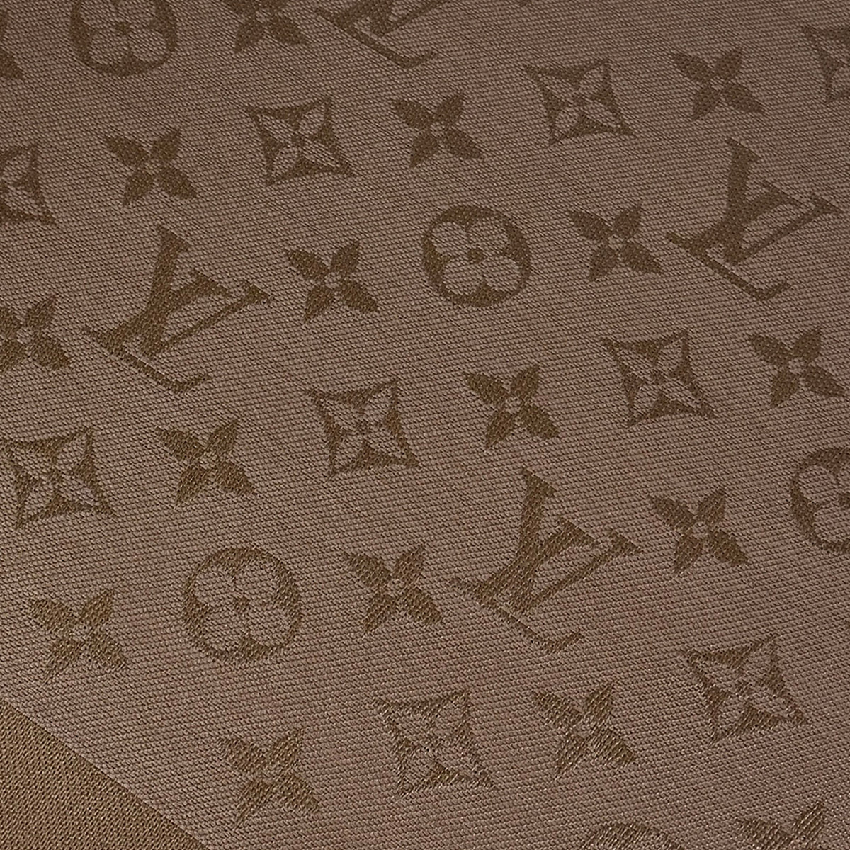 Brown monogram canvas pattern with luxury designer motifs, curated Pre-loved Luxury by Myluxe in Helsinki.