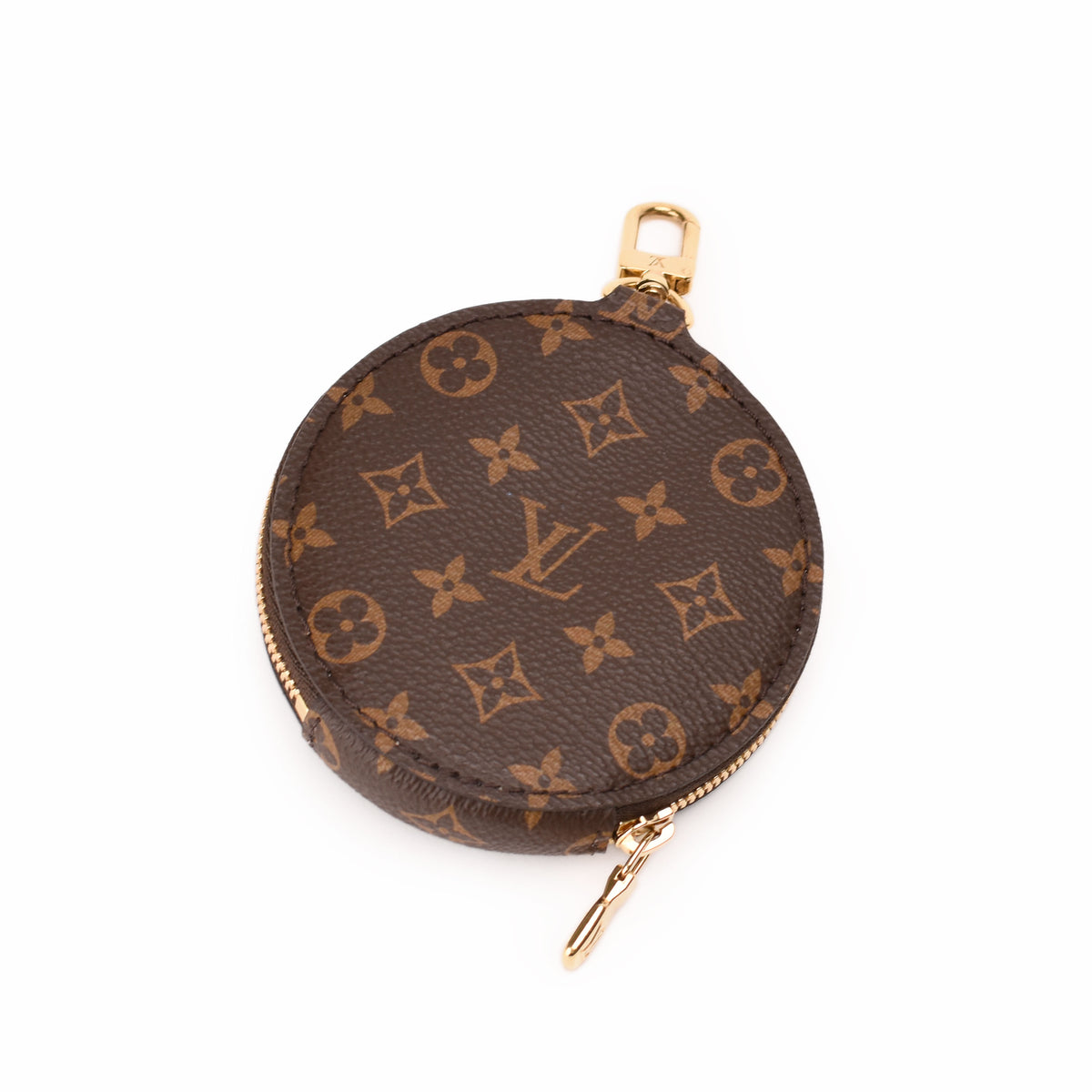 Louis Vuitton monogram canvas round coin purse in brown with gold-tone hardware. curated Pre-loved Luxury by Myluxe in Helsinki.