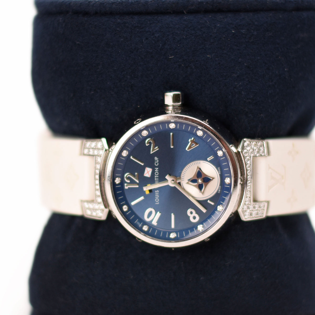 Louis Vuitton blue dial watch with white leather strap. curated Pre-loved Luxury by Myluxe in Helsinki.