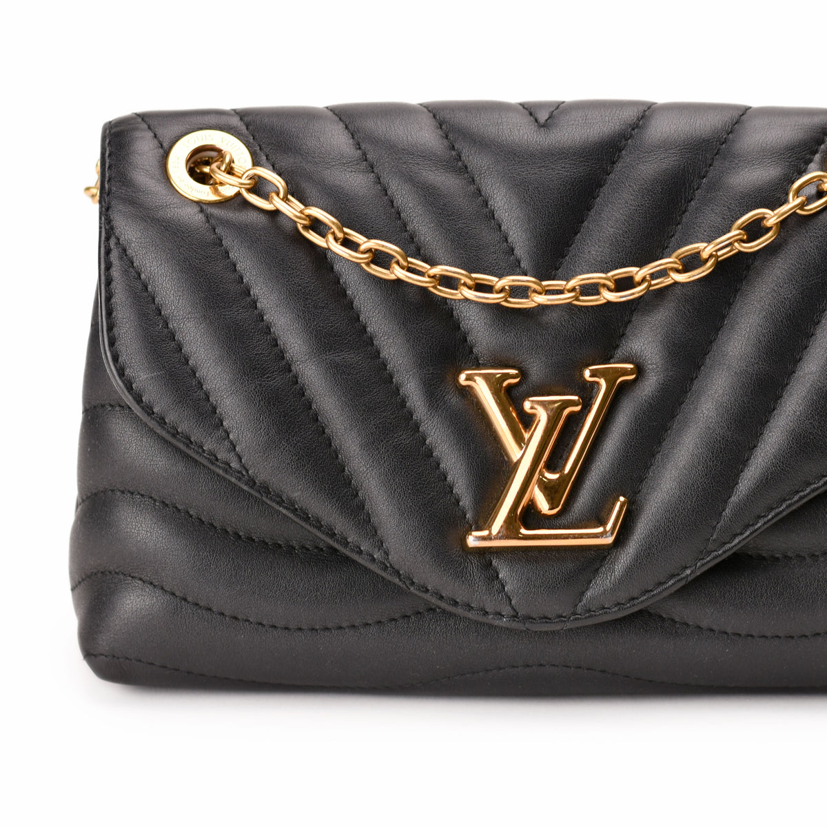 Black quilted leather Louis Vuitton handbag with gold-tone chain and LV logo, curated Pre-loved Luxury by Myluxe in Helsinki.