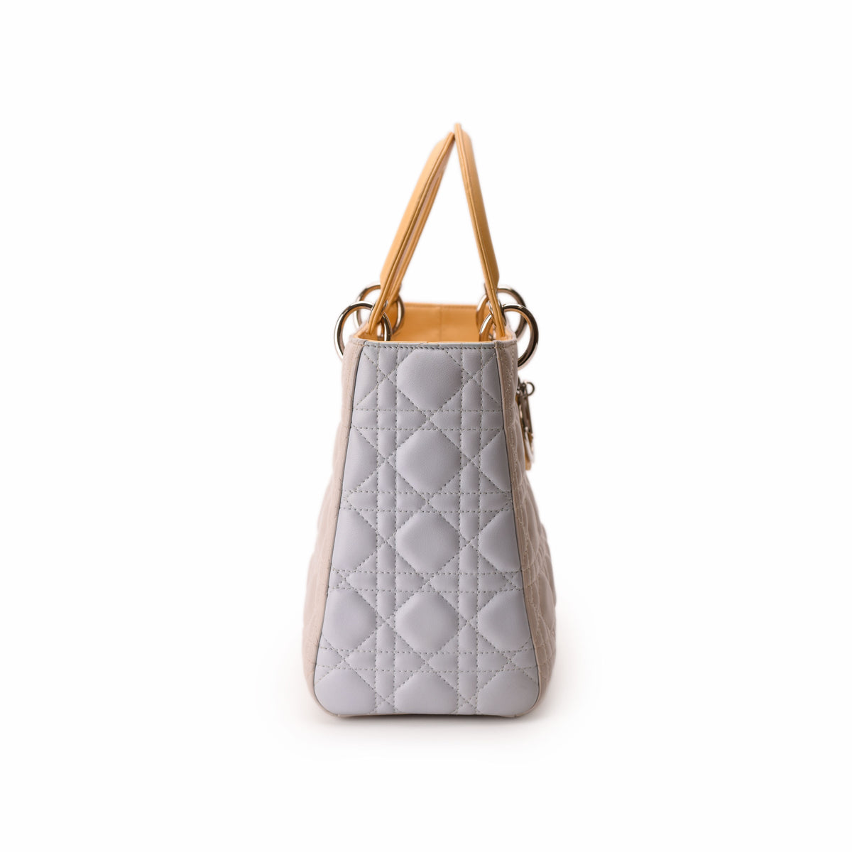 Grey quilted leather handbag with tan handles, curated Pre-loved Luxury by Myluxe in Helsinki.