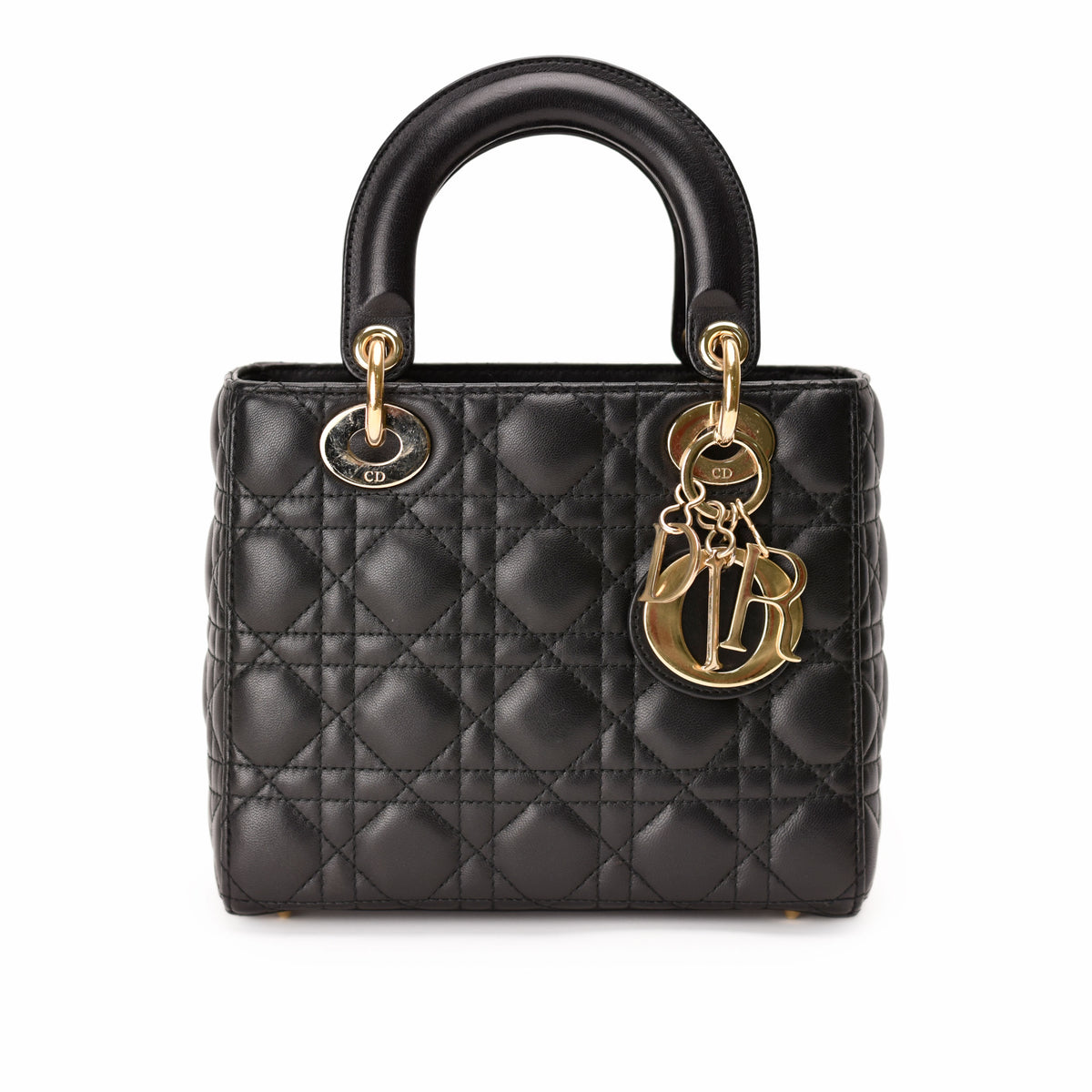 Black quilted leather Dior handbag with gold-tone hardware, curated Pre-loved Luxury by Myluxe in Helsinki.