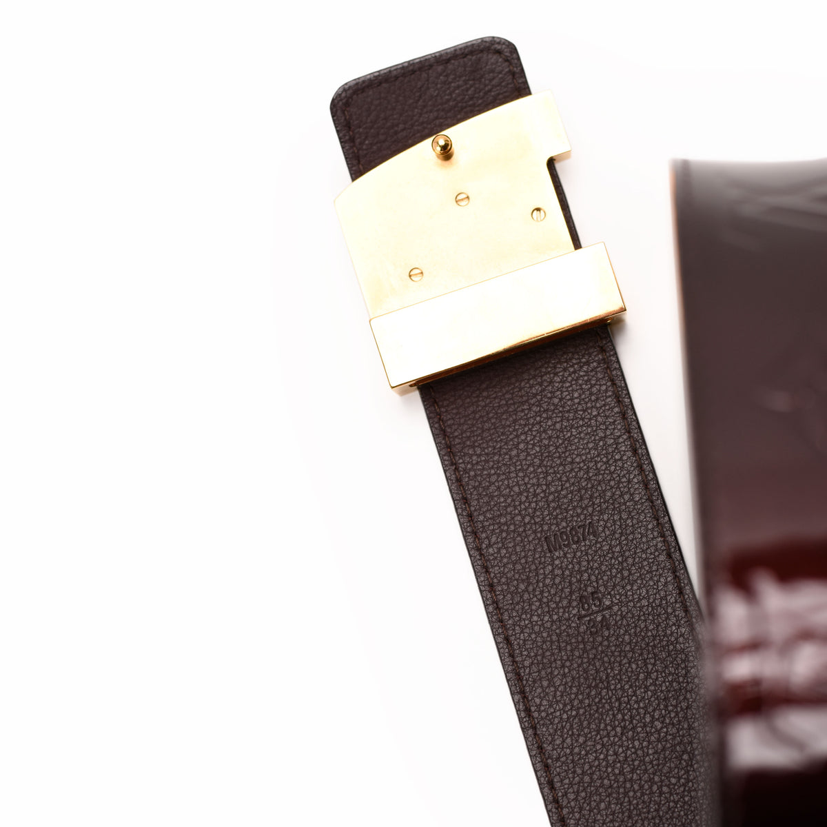Dark brown pebbled leather belt with a polished gold-tone rectangular buckle, curated Pre-loved Luxury by Myluxe in Helsinki.