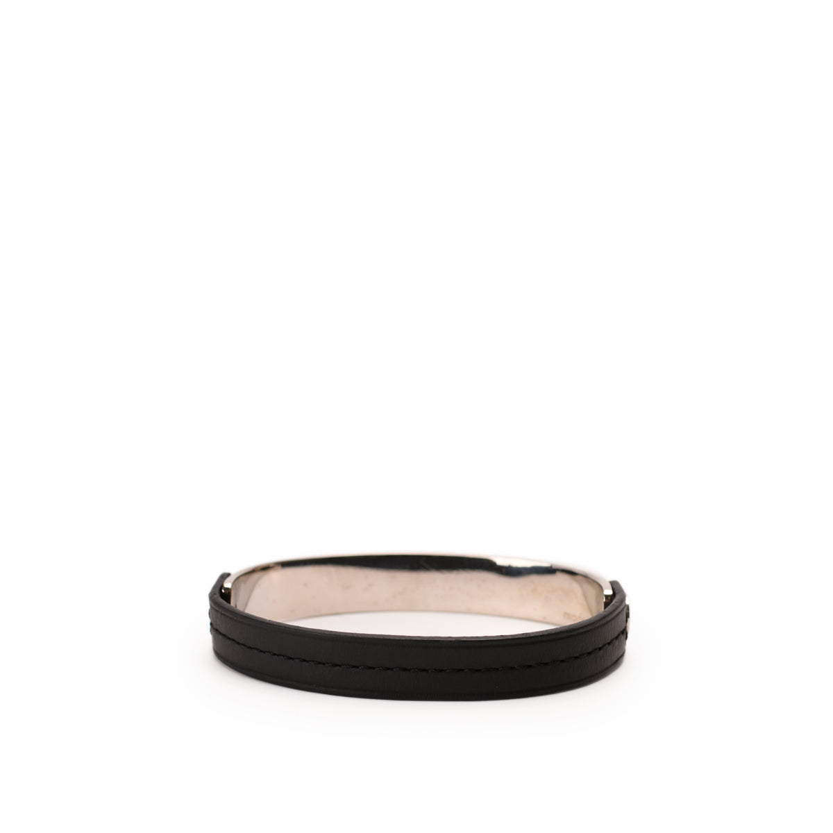 Elegant black leather bangle with silver-tone metal accents, curated Pre-loved Luxury by Myluxe in Helsinki.