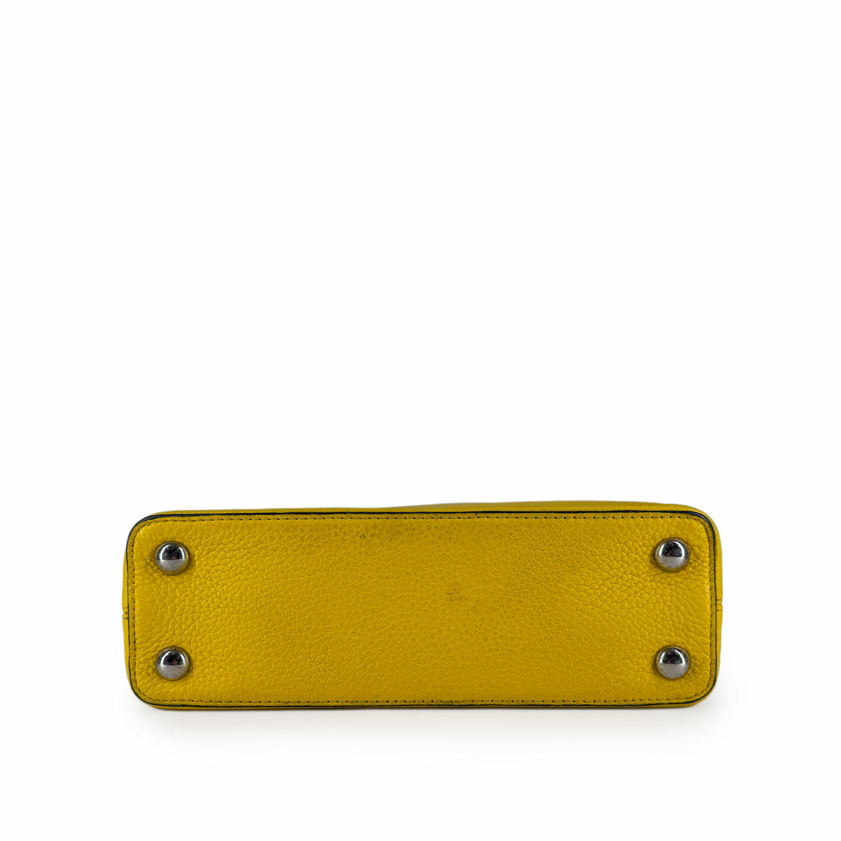 Yellow textured leather handbag base with silver metal feet, curated Pre-loved Luxury by Myluxe in Helsinki.