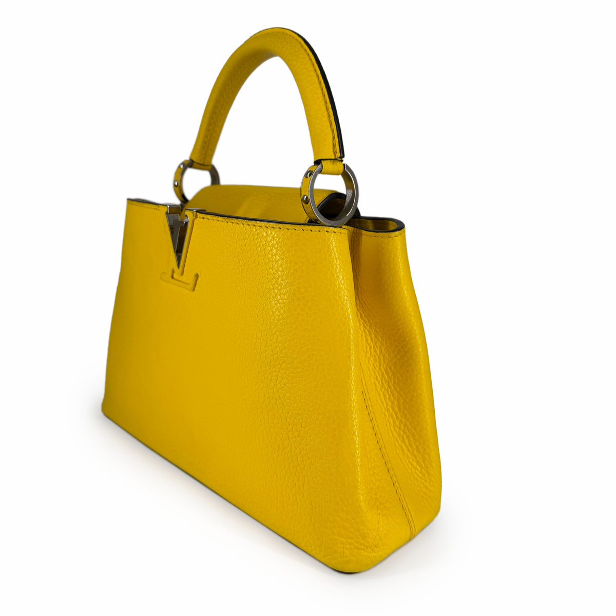 Yellow pebbled leather designer handbag with silver-tone hardware, curated Pre-loved Luxury by Myluxe in Helsinki.