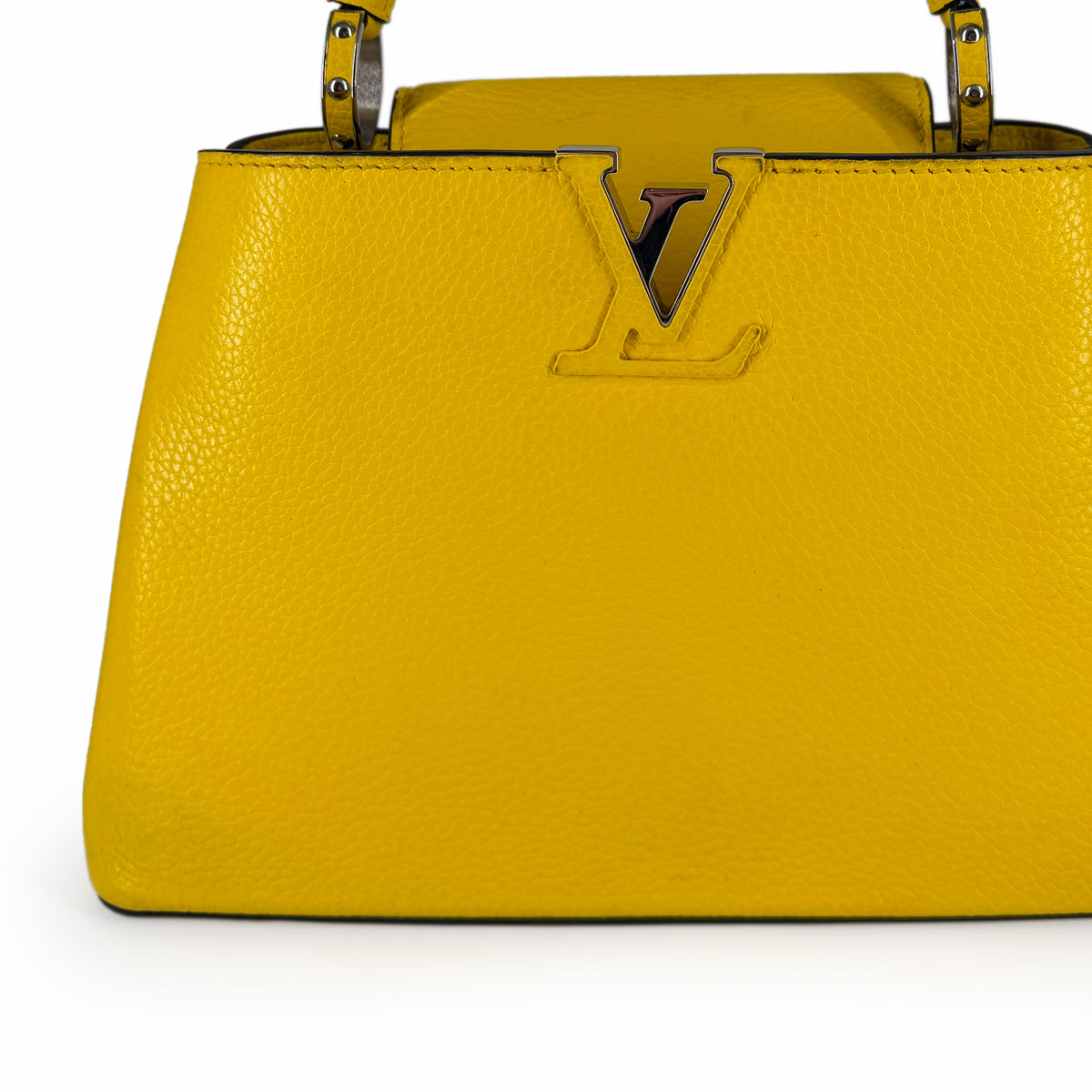 Yellow textured leather Louis Vuitton handbag, curated Pre-loved Luxury by Myluxe in Helsinki.