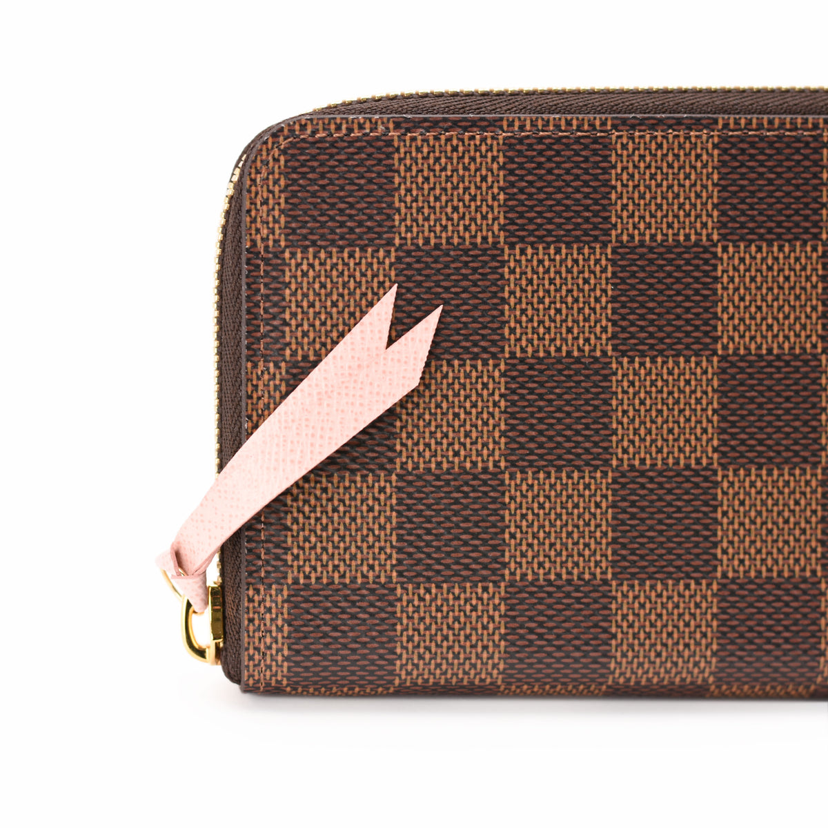 Brown Damier Ebene patterned canvas zip-around wallet with pink leather tassel, curated Pre-loved Luxury by Myluxe in Helsinki.