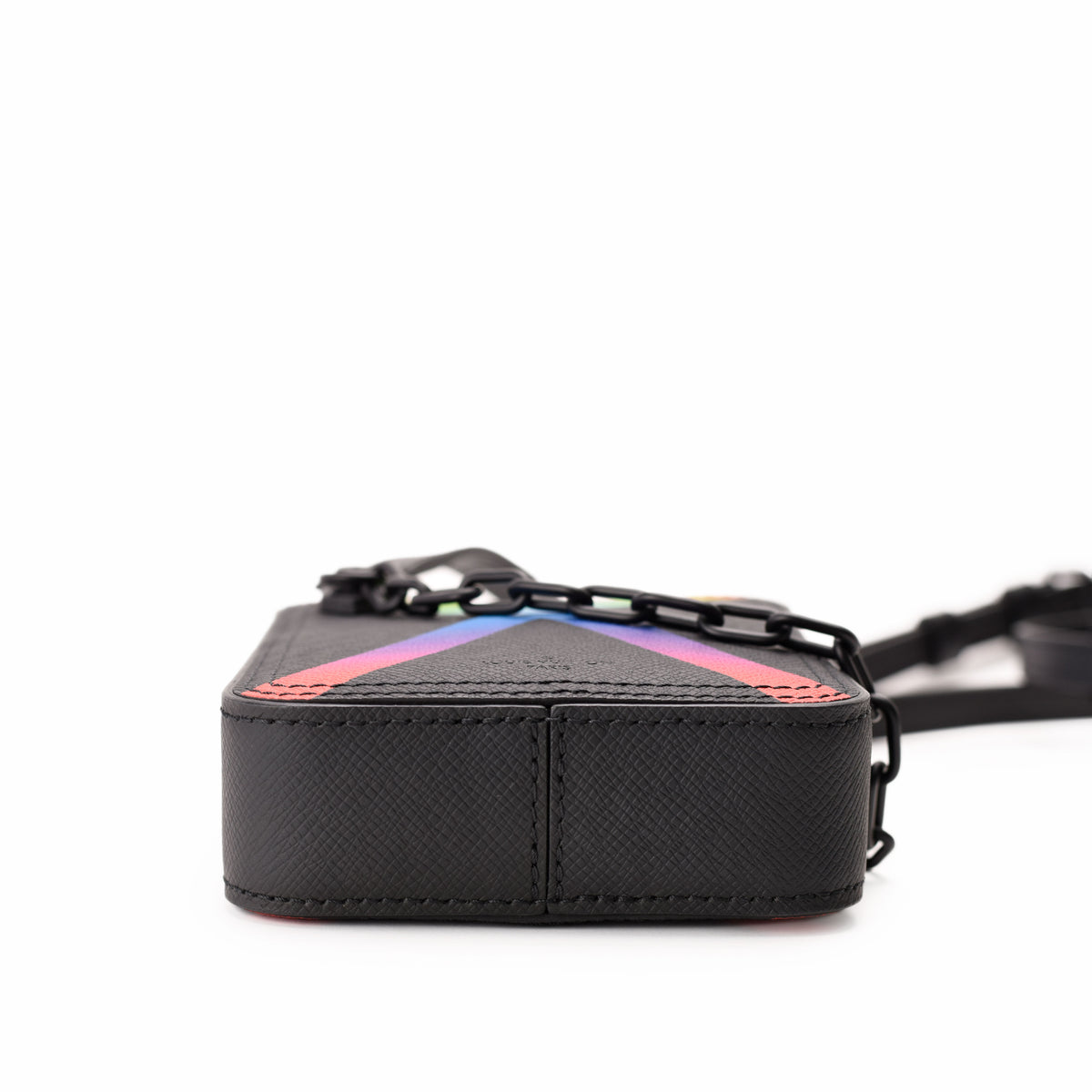 Black textured leather crossbody bag with a colorful gradient V-shaped design, curated Pre-loved Luxury by Myluxe in Helsinki.