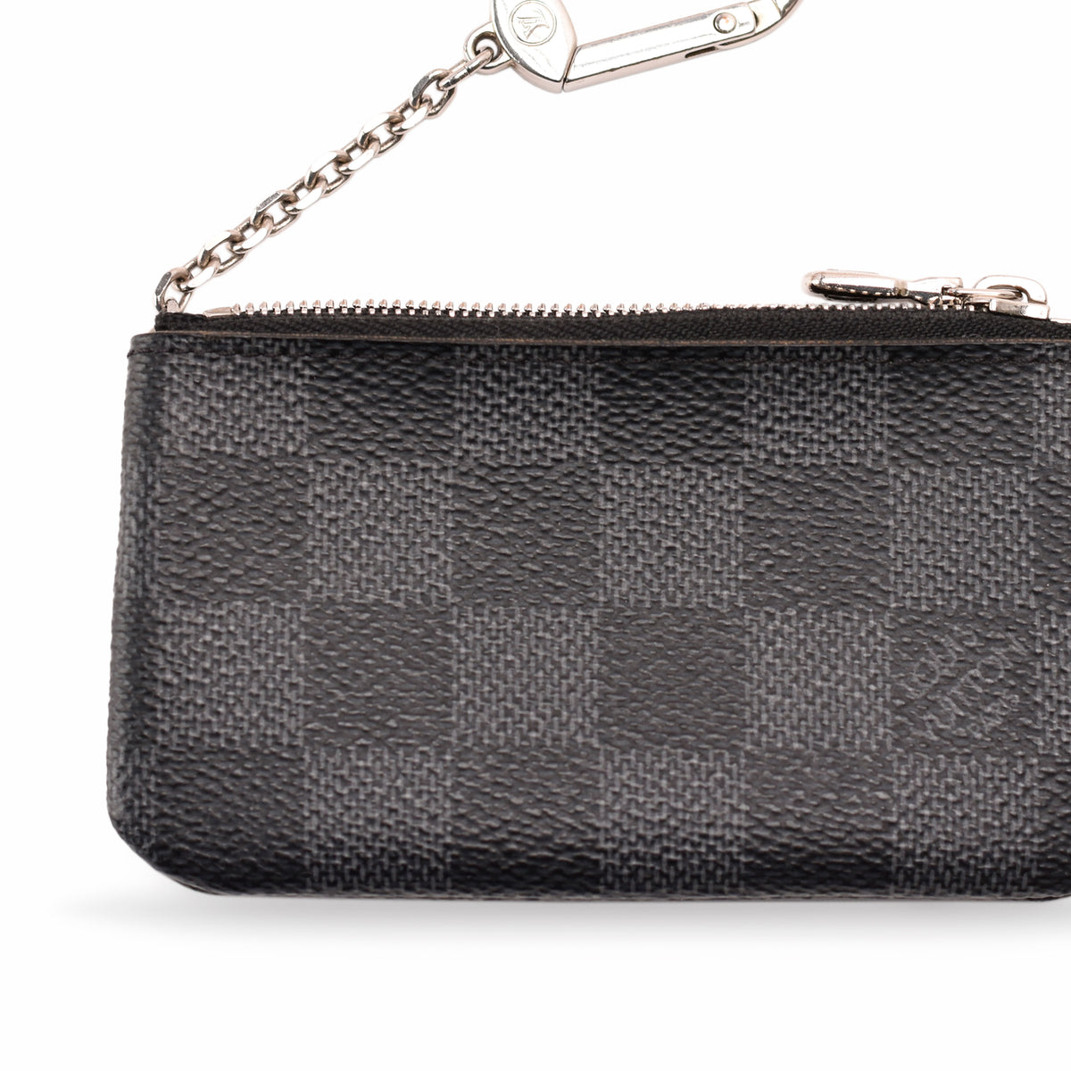 Black Damier Ebene patterned leather zip pouch with silver chain, curated Pre-loved Luxury by Myluxe in Helsinki.