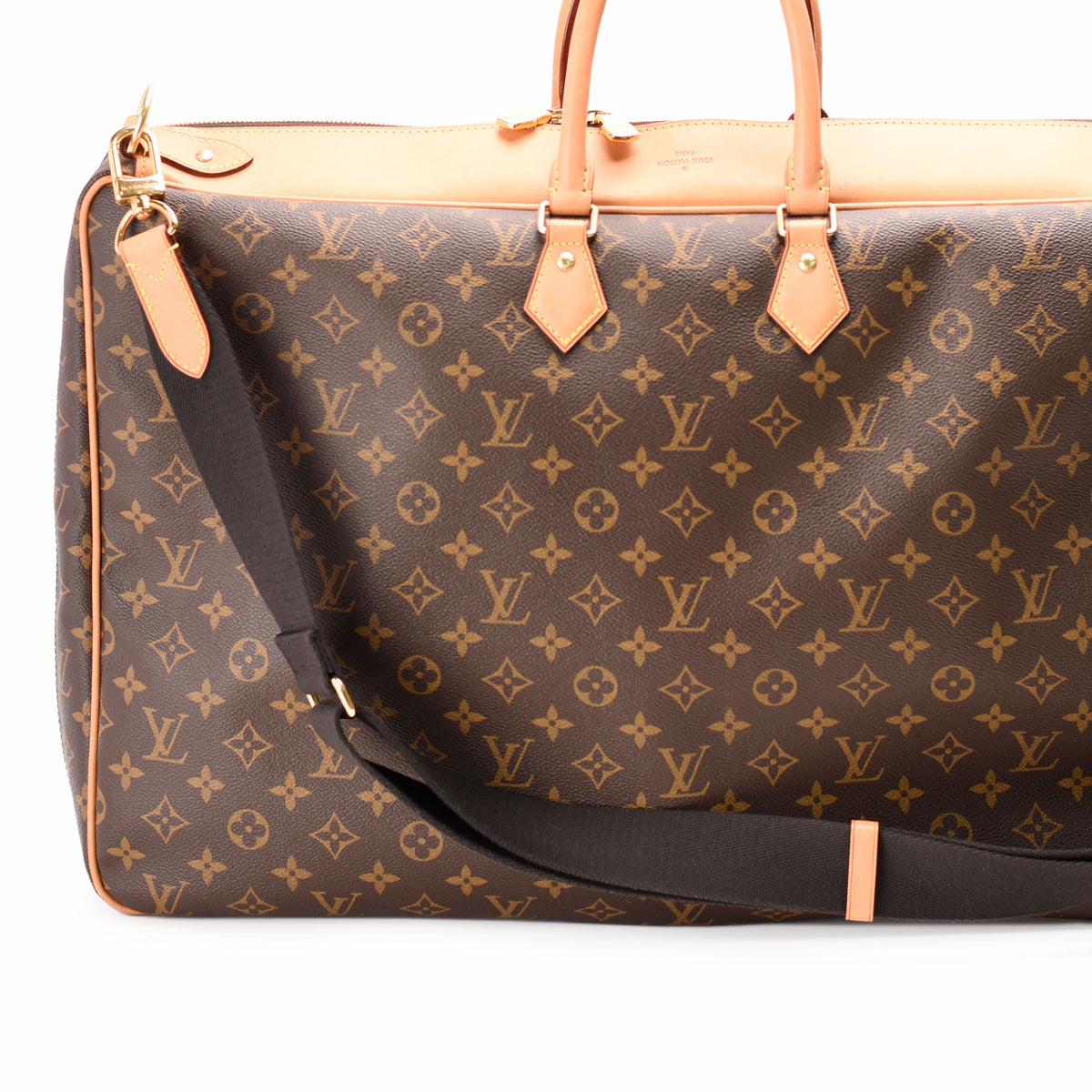 Louis Vuitton monogram brown canvas duffel bag with leather handles and strap, curated Pre-loved Luxury by Myluxe in Helsinki.