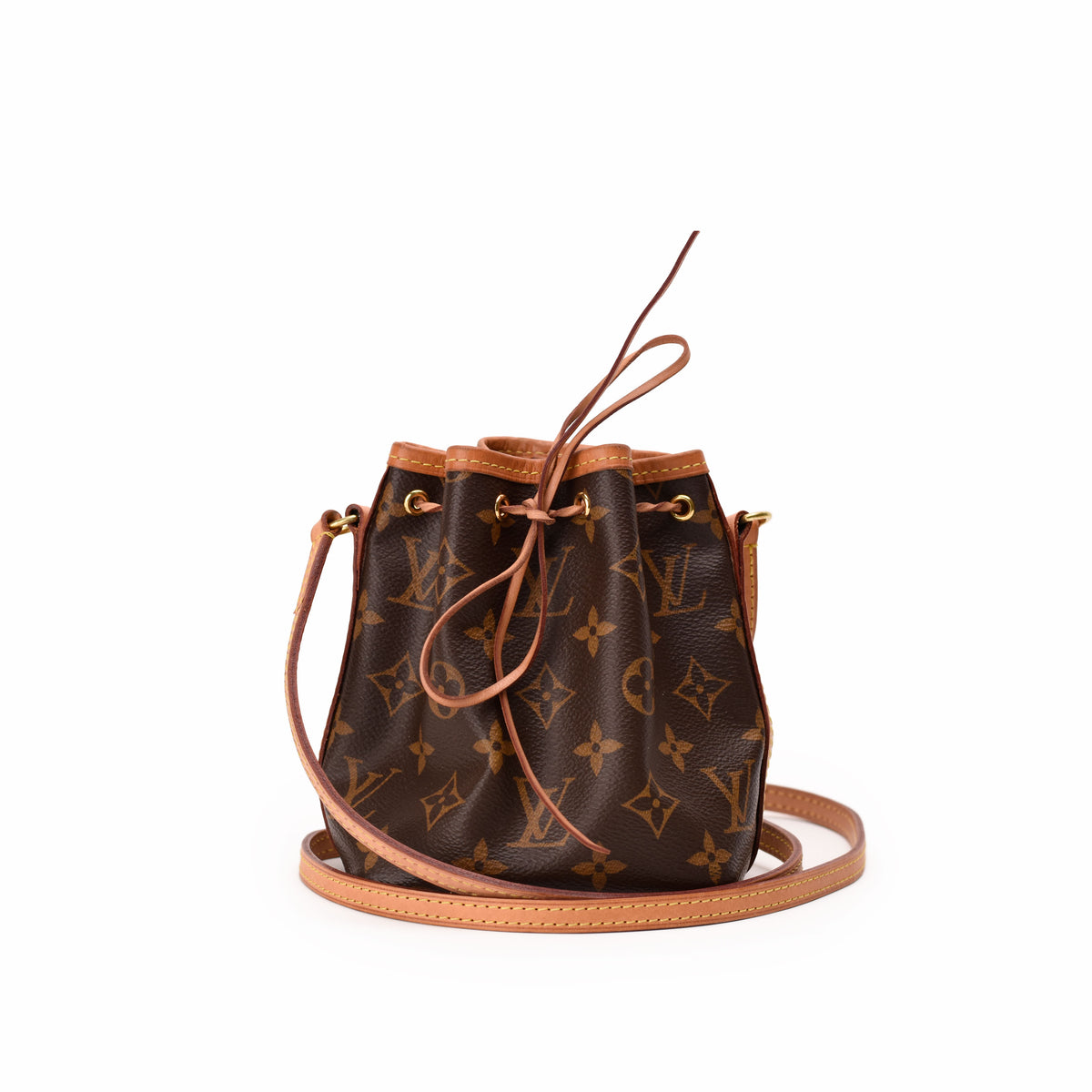 Louis Vuitton monogram canvas bucket bag in brown with tan leather trim, curated Pre-loved Luxury by Myluxe in Helsinki.