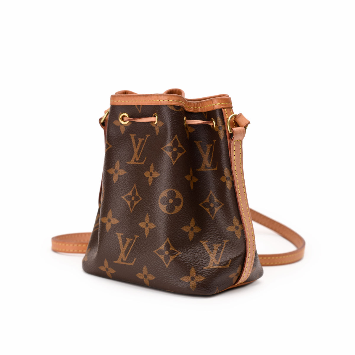Louis Vuitton monogram canvas bucket bag in brown leather, curated Pre-loved Luxury by Myluxe in Helsinki.