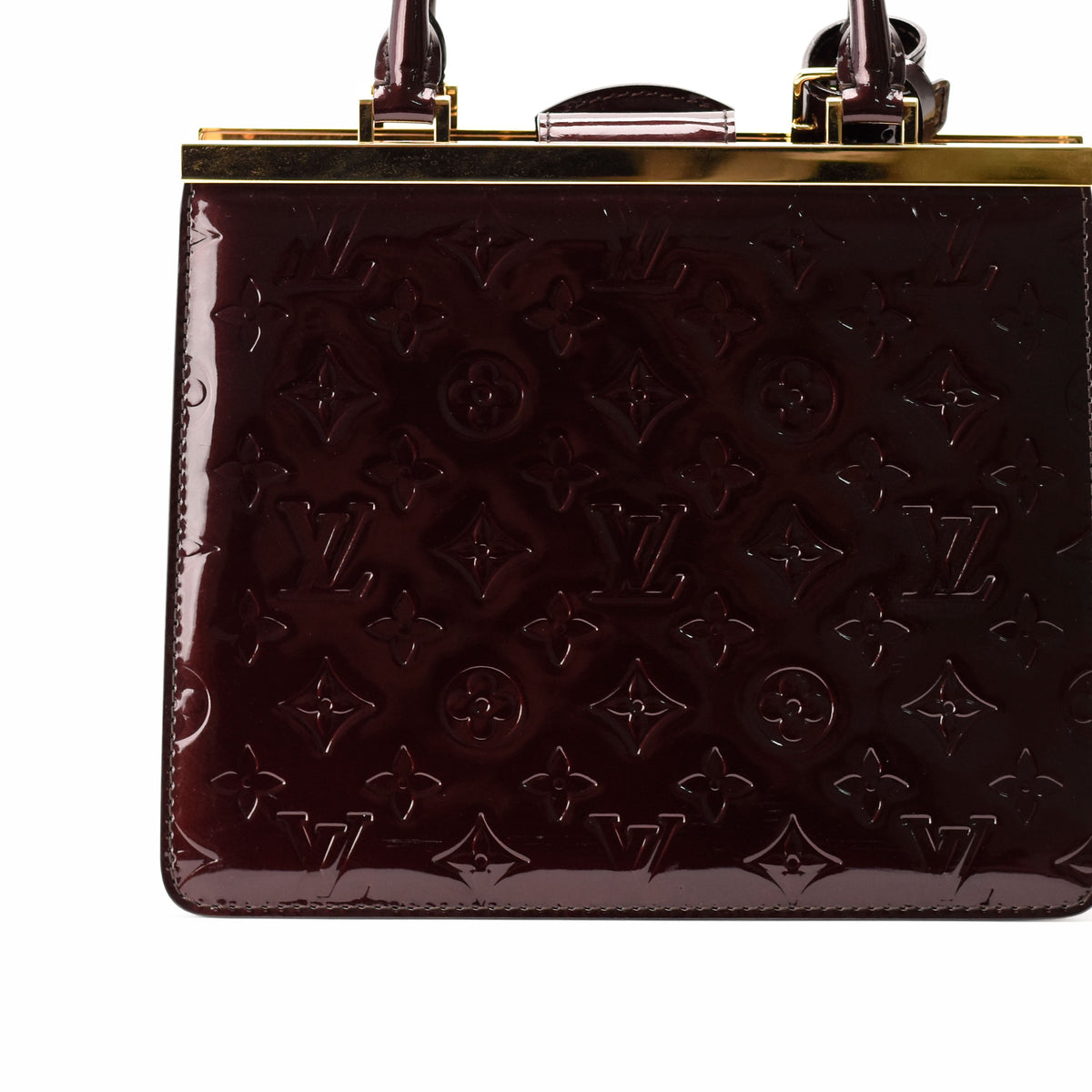 Dark burgundy patent leather monogrammed luxury handbag with gold-tone frame, curated Pre-loved Luxury by Myluxe in Helsinki.