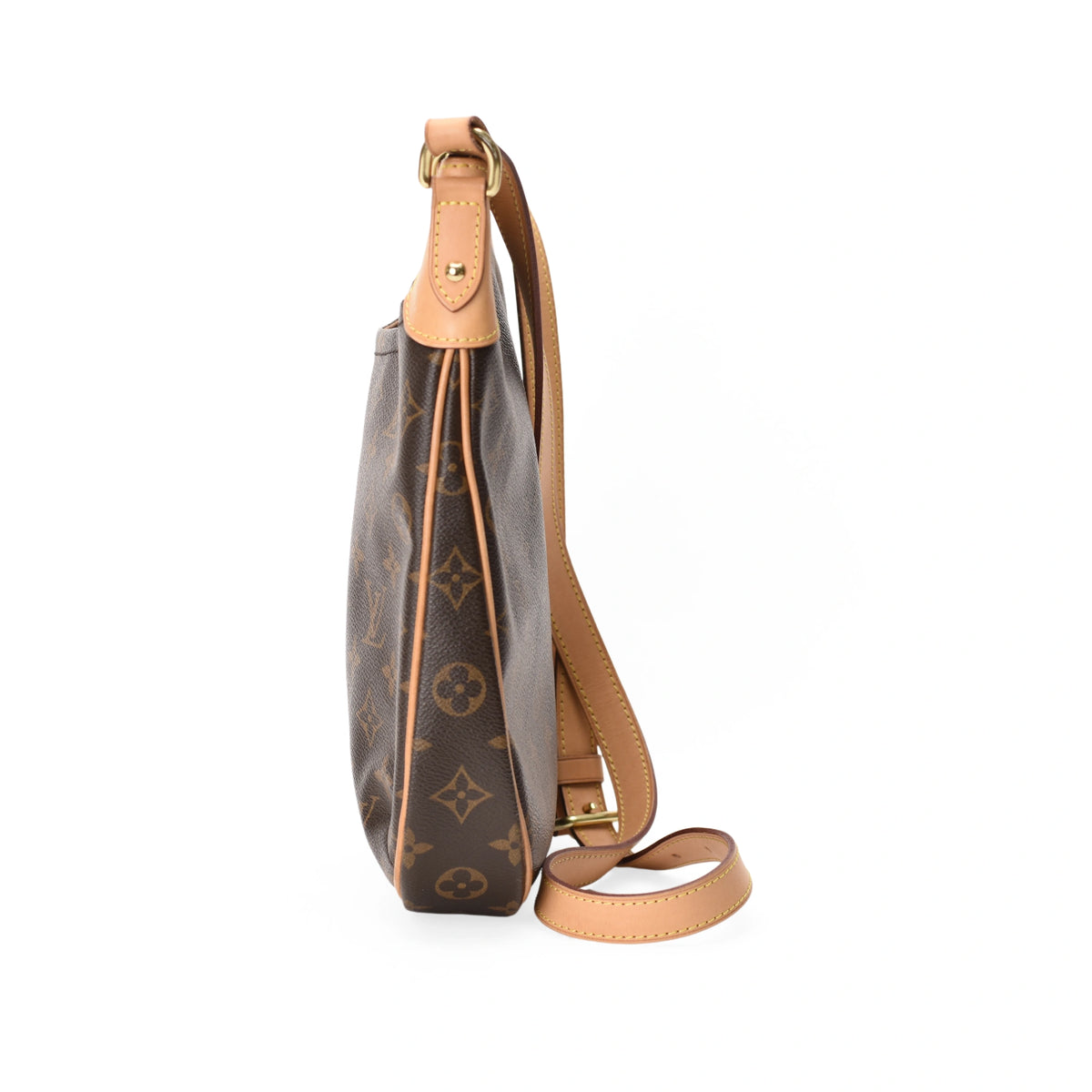 Side view of a Louis Vuitton Odeon PM in brown monogram canvas with tan leather strap. curated Pre-loved Luxury by Myluxe in Helsinki.