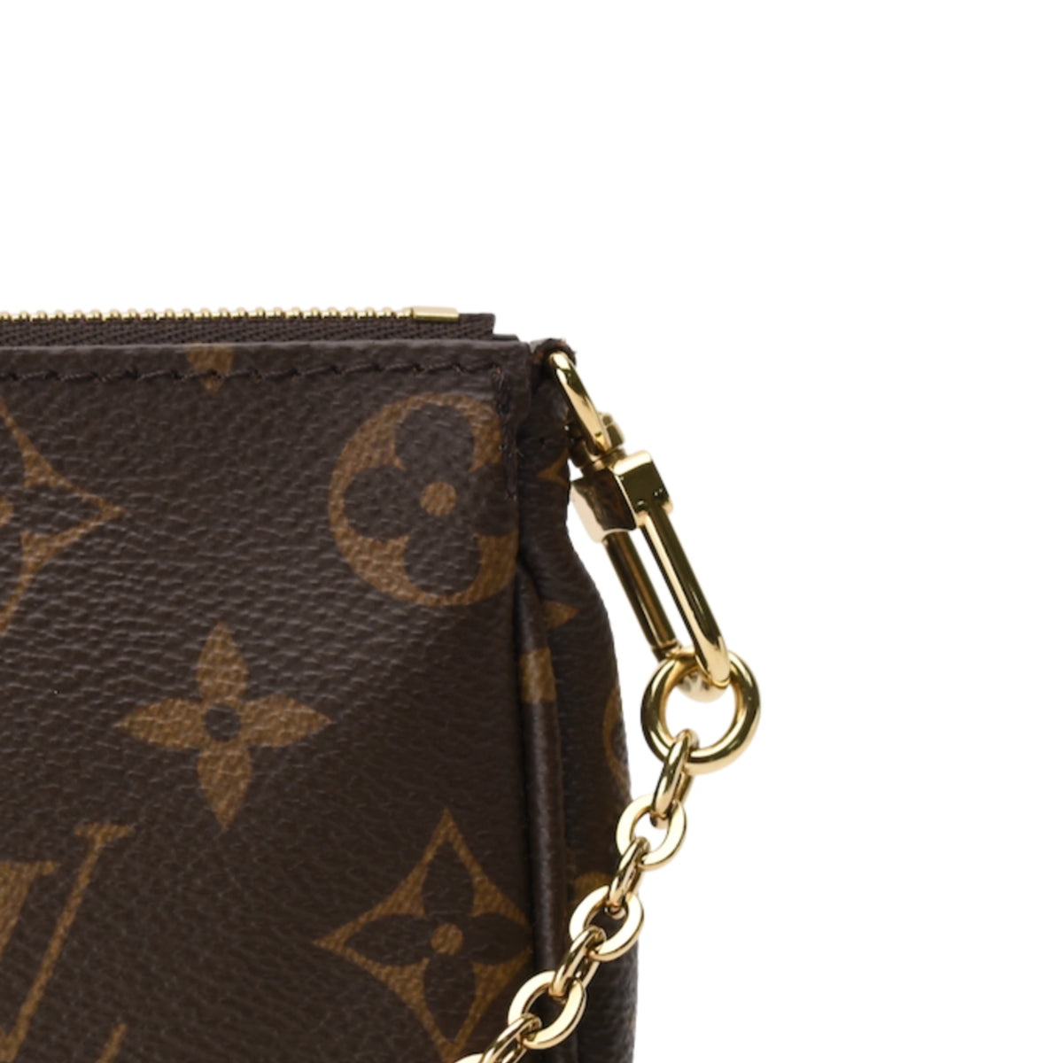 Louis Vuitton Monogram Canvas Multi Pochette Mini Pochette in brown with gold-tone hardware. curated Pre-loved Luxury by Myluxe in Helsinki.