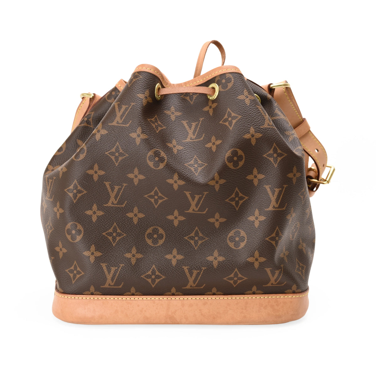 Louis Vuitton Monogram canvas bucket bag in brown with tan leather trim. curated Pre-loved Luxury by Myluxe in Helsinki.