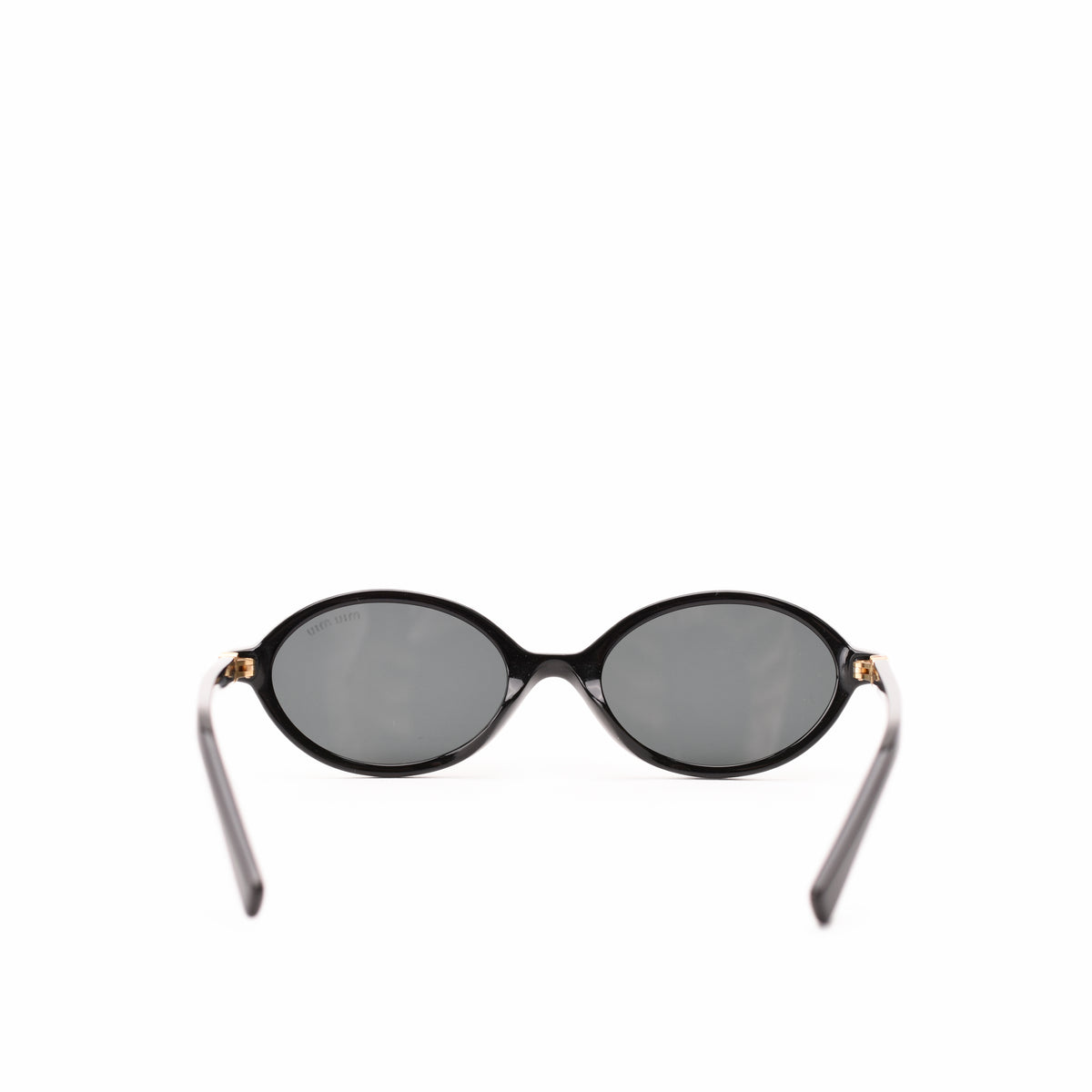 Tom Ford black oval sunglasses with dark grey lenses. curated Pre-loved Luxury by Myluxe in Helsinki.