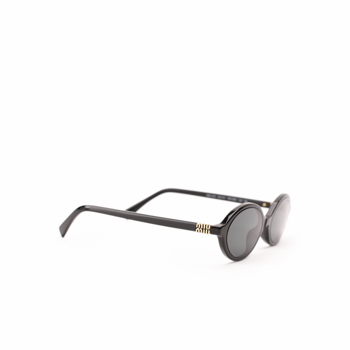 Black round-frame acetate sunglasses with gold-tone temple accents. curated Pre-loved Luxury by Myluxe in Helsinki.