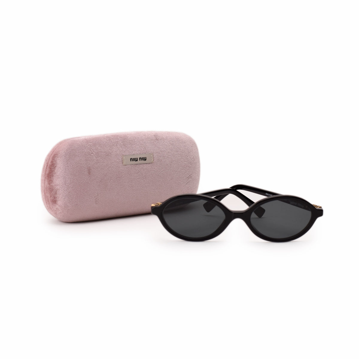 Black round frame sunglasses with a pink velvet case. curated Pre-loved Luxury by Myluxe in Helsinki.