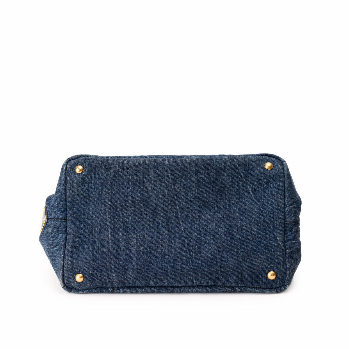 Blue denim luxury handbag base with gold-tone metal studs. curated Pre-loved Luxury by Myluxe in Helsinki.
