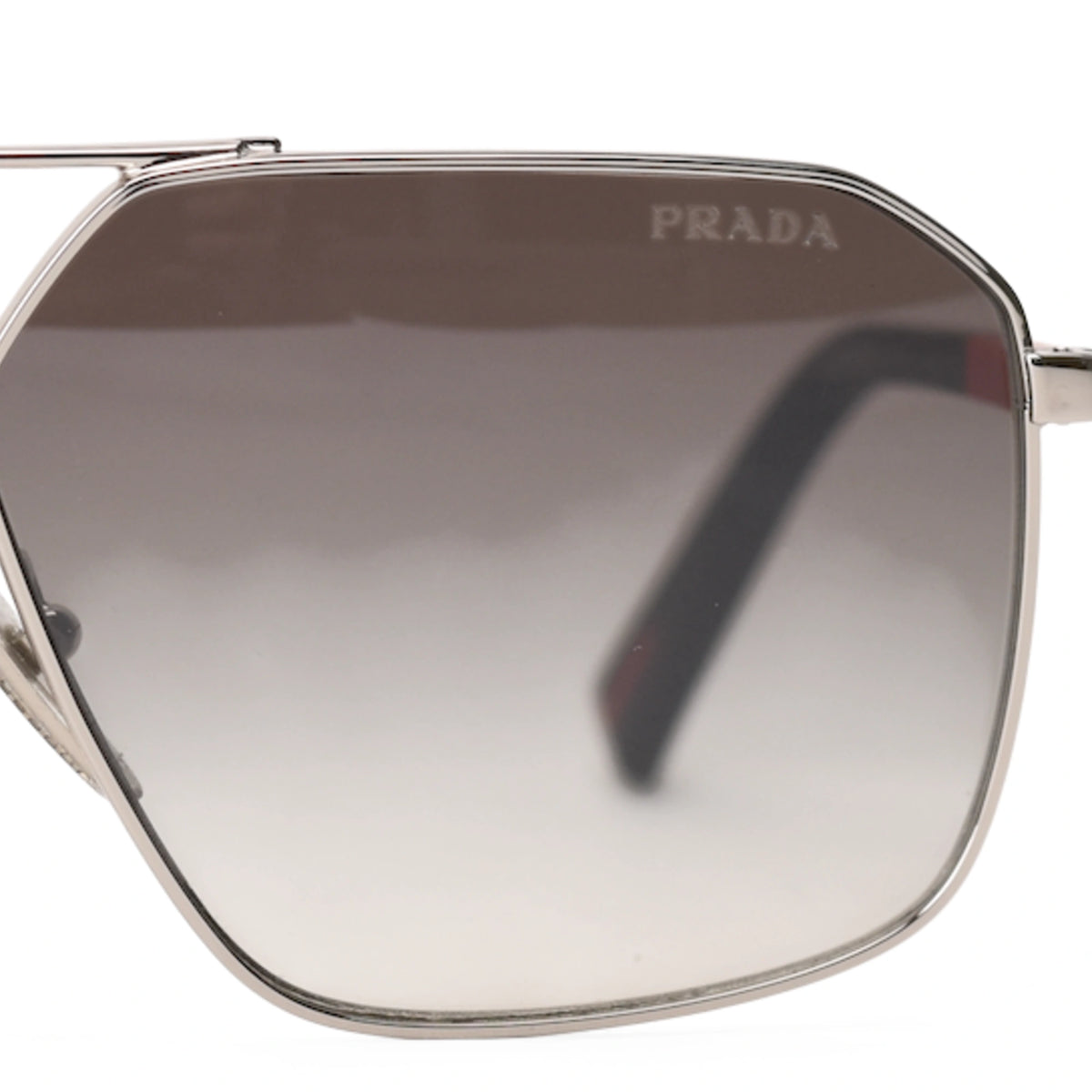 Prada Linea Rossa silver frame sunglasses with gradient lenses, curated Pre-loved Luxury by Myluxe in Helsinki.