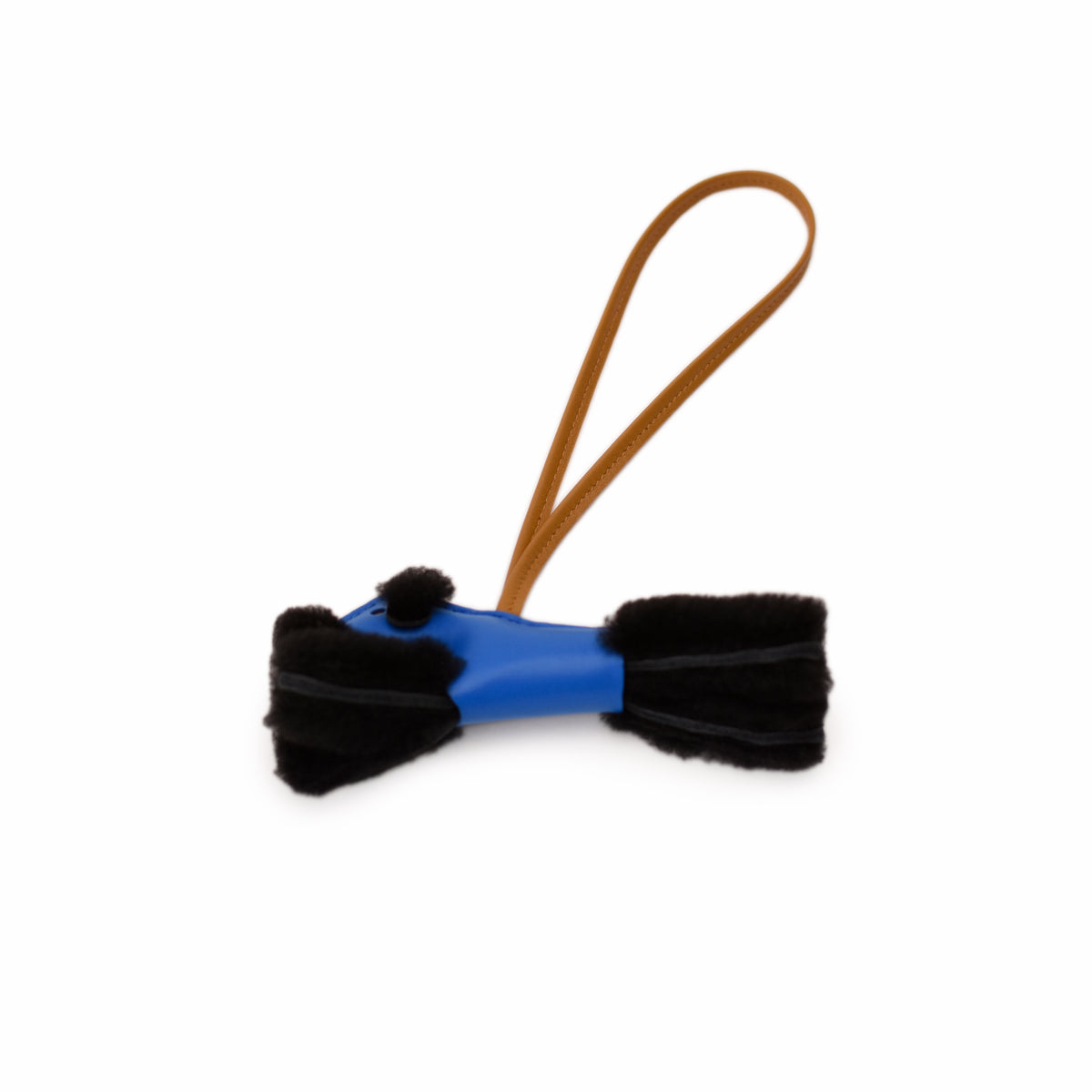 Blue leather and black faux fur charm accessory. curated Pre-loved Luxury by Myluxe in Helsinki.