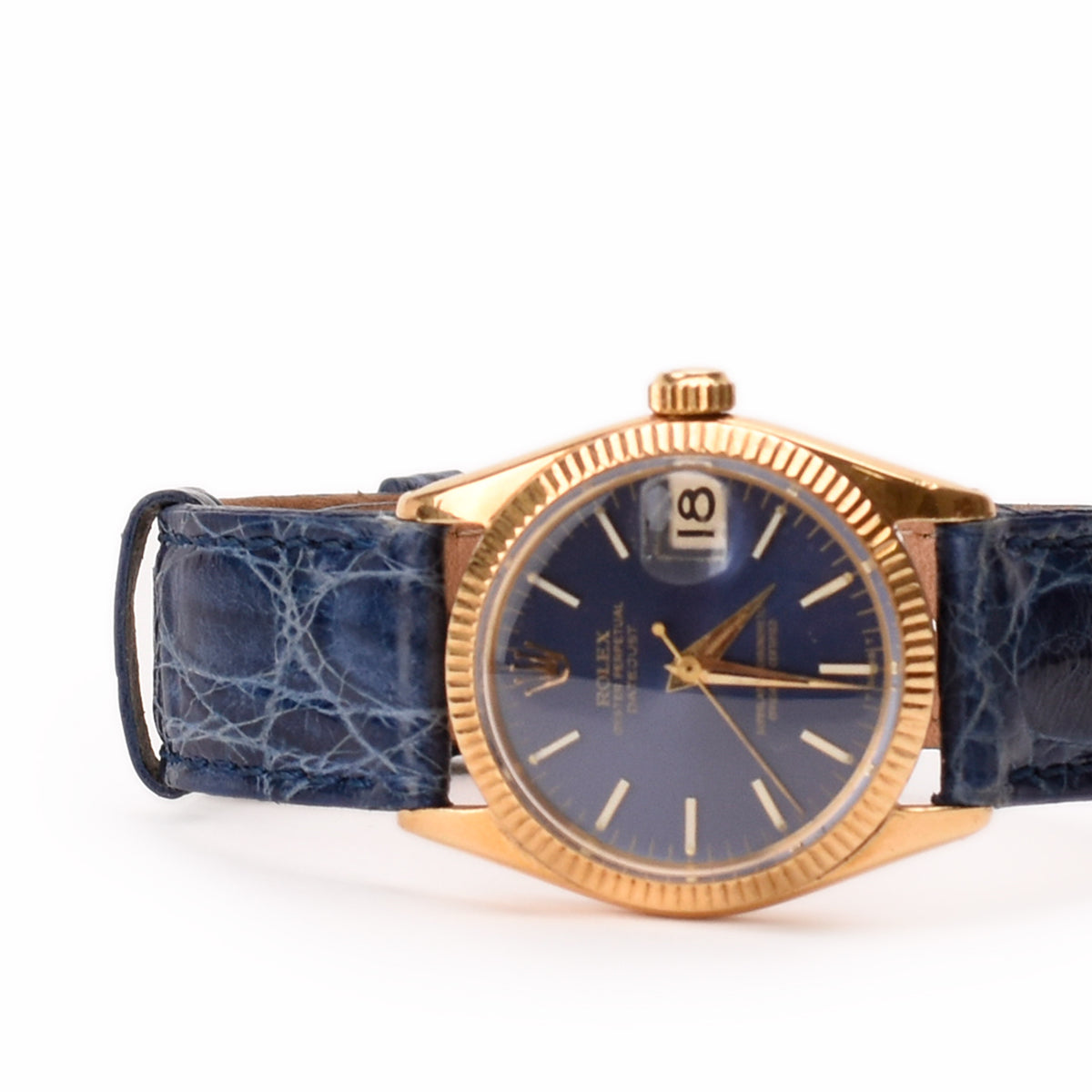 Gold Rolex Datejust watch with blue dial and blue crocodile leather strap. curated Pre-loved Luxury by Myluxe in Helsinki.