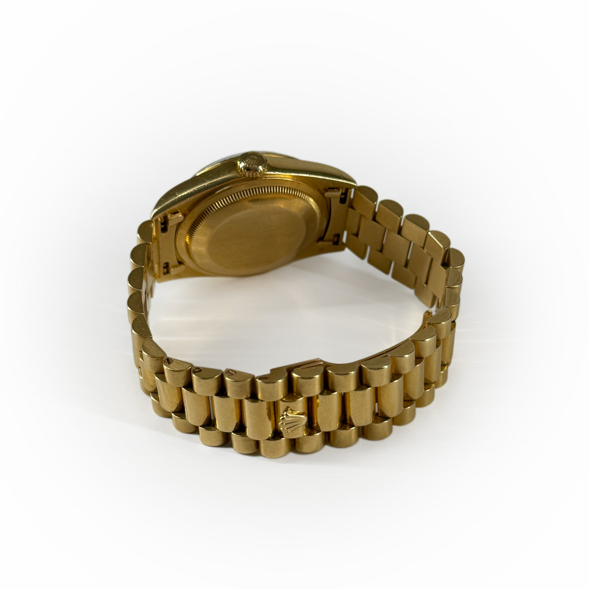 Gold-tone luxury men's wristwatch with a metallic link bracelet, curated Pre-loved Luxury by Myluxe in Helsinki.