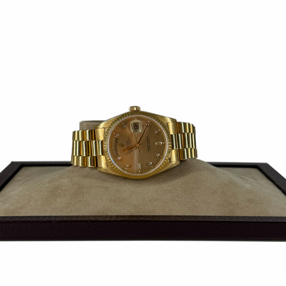 Gold Rolex Day-Date watch with champagne dial, curated Pre-loved Luxury by Myluxe in Helsinki.