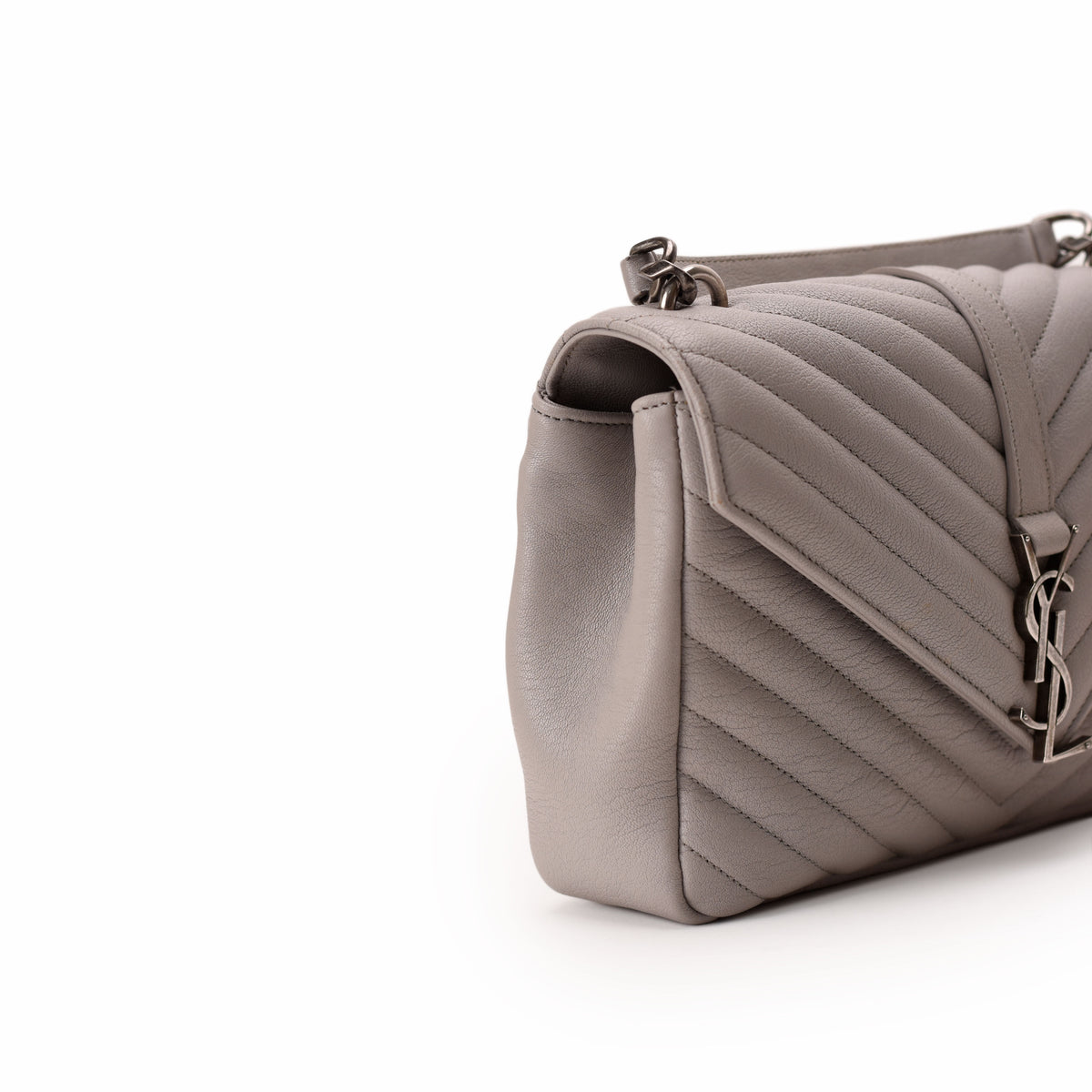 Taupe quilted leather Saint Laurent handbag with YSL logo. curated Pre-loved Luxury by Myluxe in Helsinki.