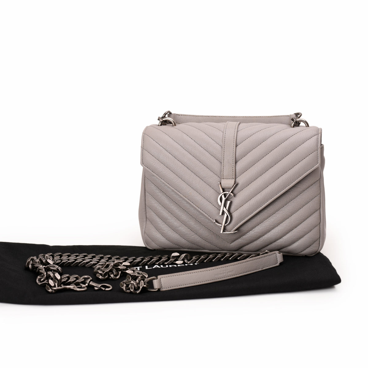 Grey quilted leather Saint Laurent handbag with silver YSL logo, curated Pre-loved Luxury by Myluxe in Helsinki.