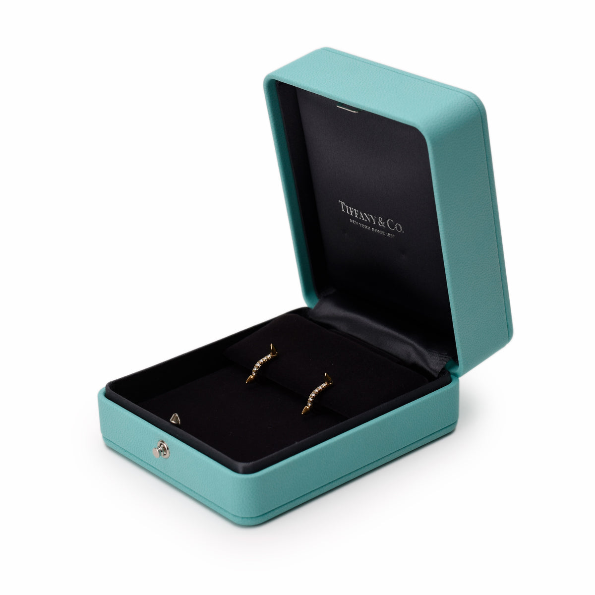 Tiffany & Co. gold diamond stud earrings in a signature blue box, curated Pre-loved Luxury by Myluxe in Helsinki.