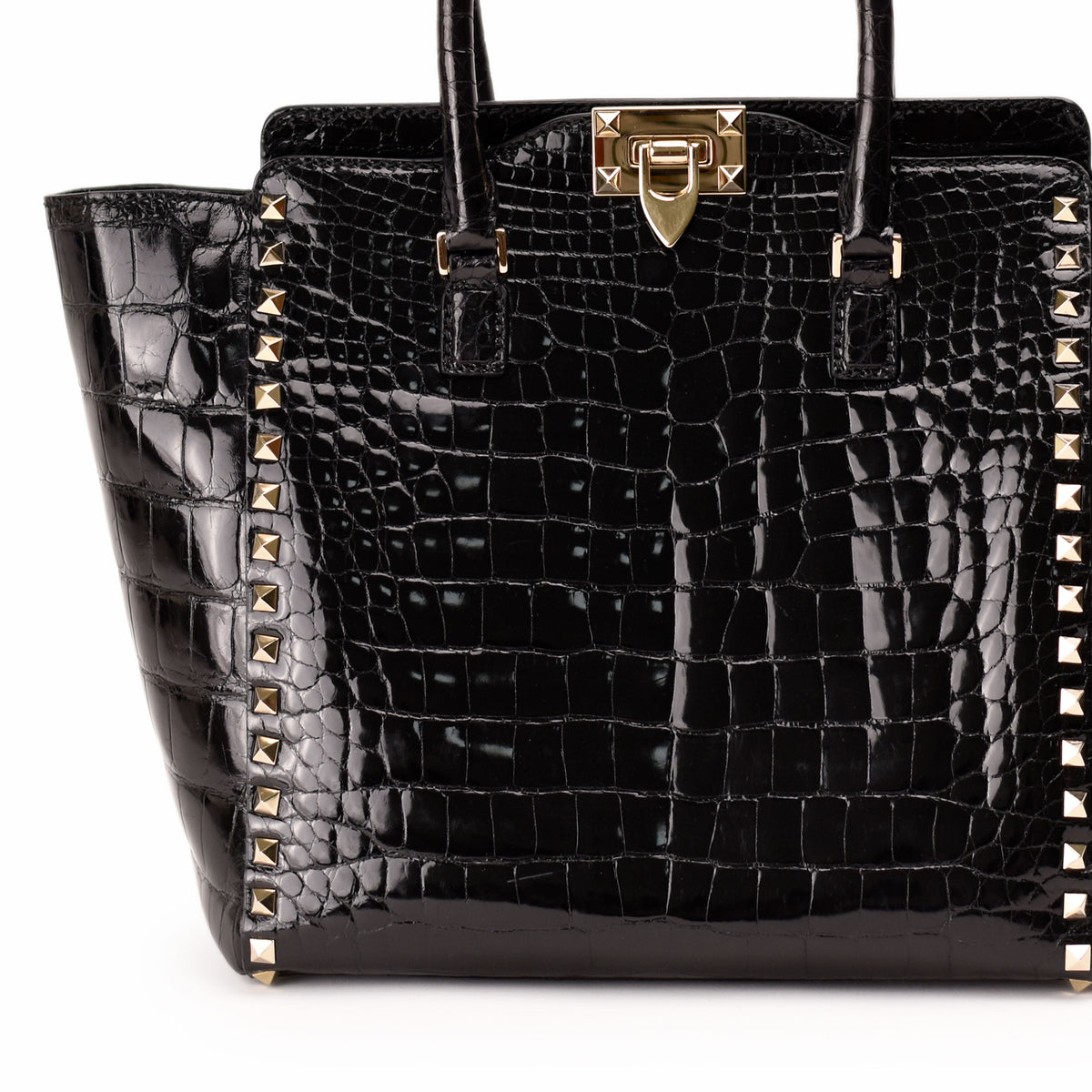 Black croc-embossed leather handbag with gold studs and clasp. curated Pre-loved Luxury by Myluxe in Helsinki.
