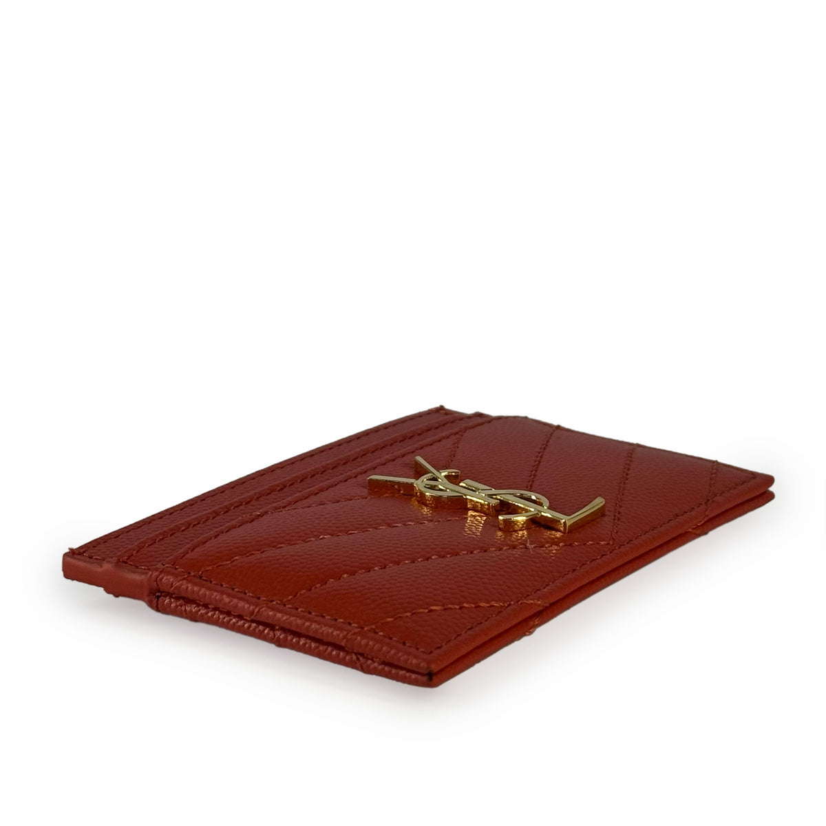 Red leather Saint Laurent card holder with gold-tone YSL logo, curated Pre-loved Luxury by Myluxe in Helsinki.