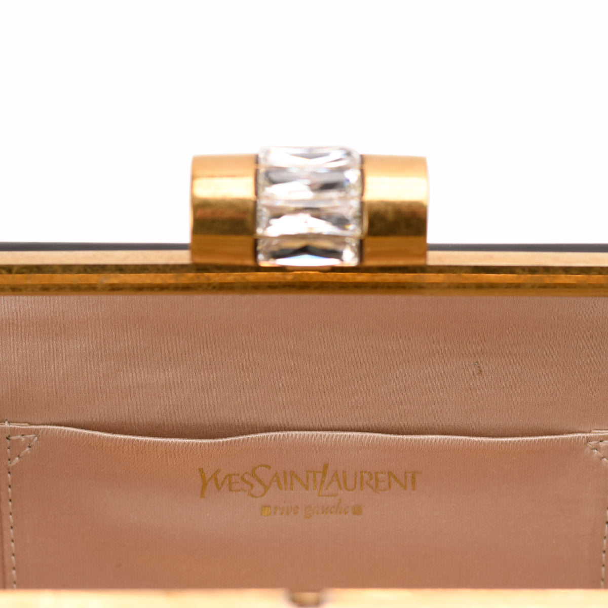 Yves Saint Laurent gold-tone clasp clutch with crystal embellishment, curated Pre-loved Luxury by Myluxe in Helsinki.