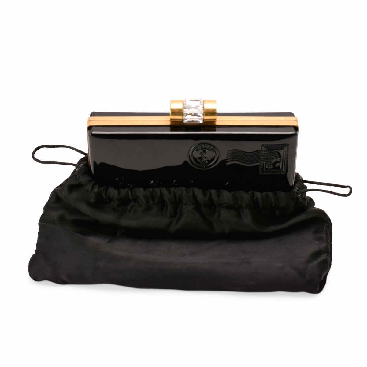 Black patent leather clutch with gold-tone hardware and crystal clasp, curated Pre-loved Luxury by Myluxe in Helsinki.