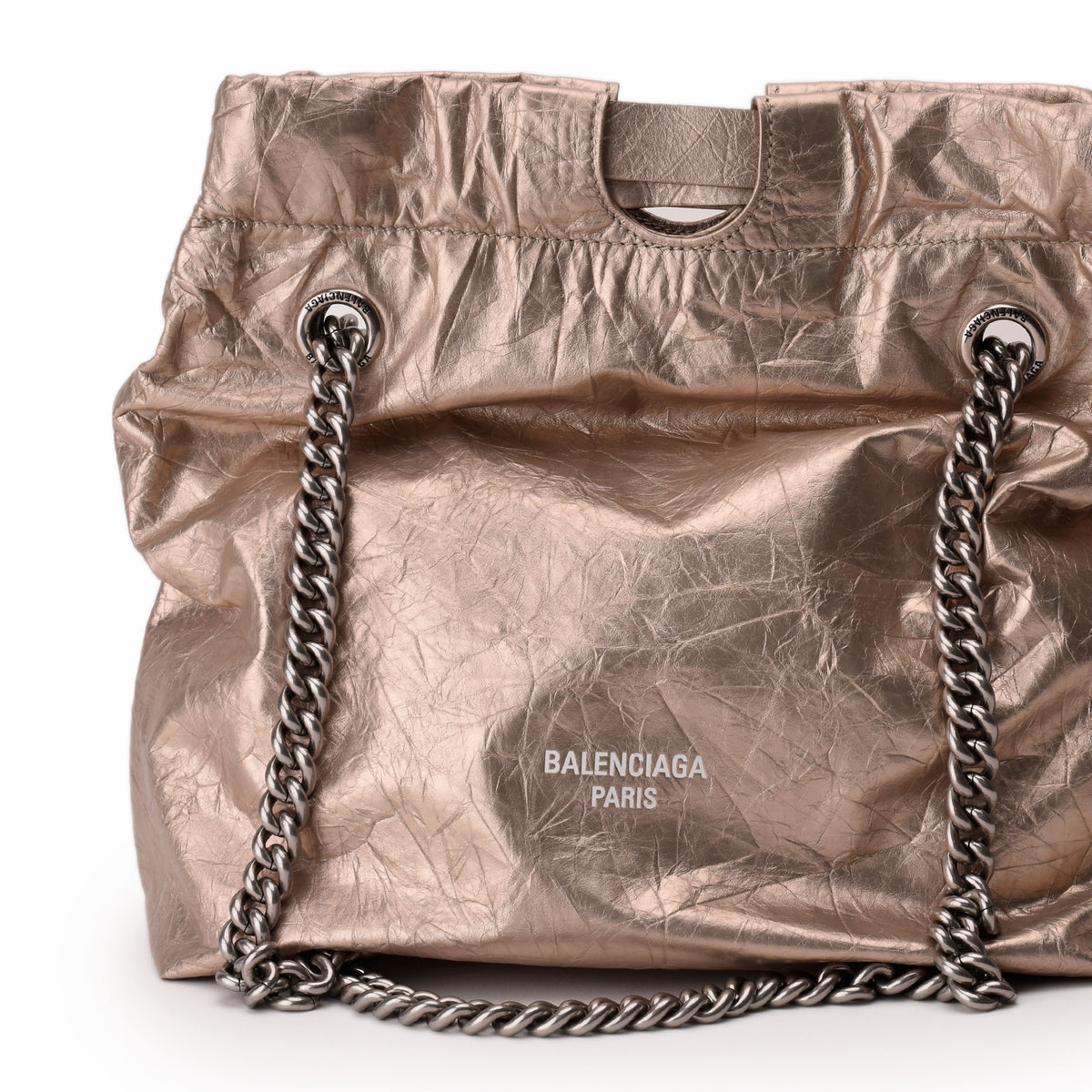 Balenciaga Paris rose gold metallic crumpled leather shoulder bag with silver chain strap, curated Pre-loved Luxury by Myluxe in Helsinki.